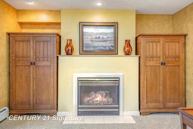105 Parkwood Ct, Bay City, MI 48706 - room details featuring a baseboard radiator and recessed lighting