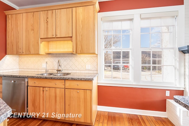 105 Parkwood Ct, Bay City, MI 48706 - kitchen with stainless steel dishwasher, hardwood / wood-style floors, baseboards, and a sink