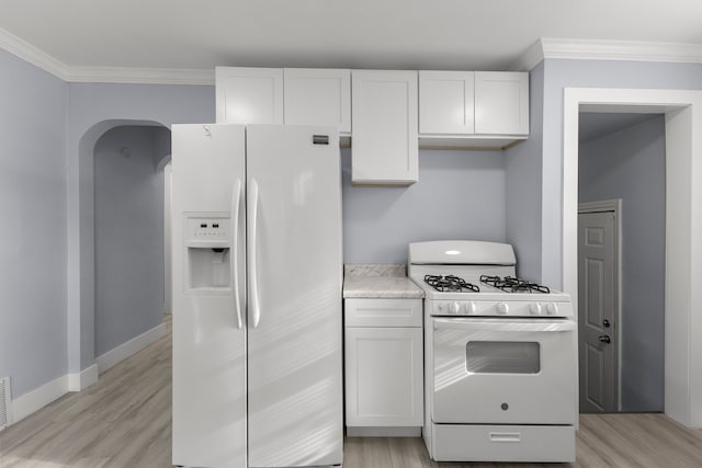 7416 Heyden St, Detroit, MI 48228 - kitchen featuring light wood-type flooring, white cabinetry, ornamental molding, and white appliances