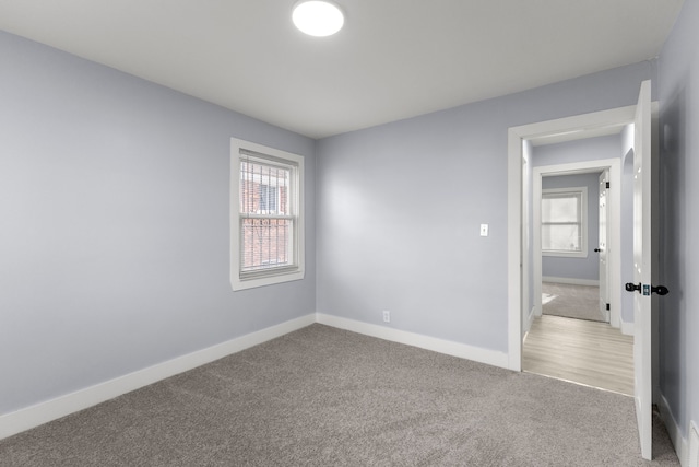7416 Heyden St, Detroit, MI 48228 - unfurnished bedroom with baseboards and light carpet