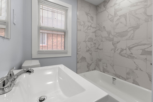 7416 Heyden St, Detroit, MI 48228 - full bathroom featuring a sink, toilet, and a bath
