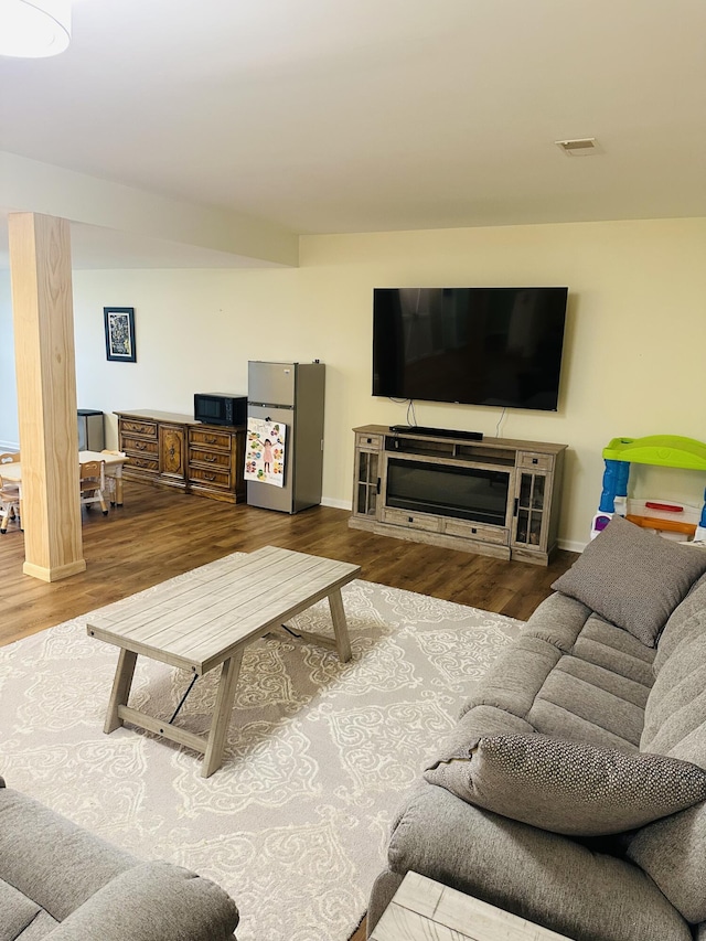133 Bingham Dr, Brooklyn, MI 49230 - living room with wood finished floors and baseboards
