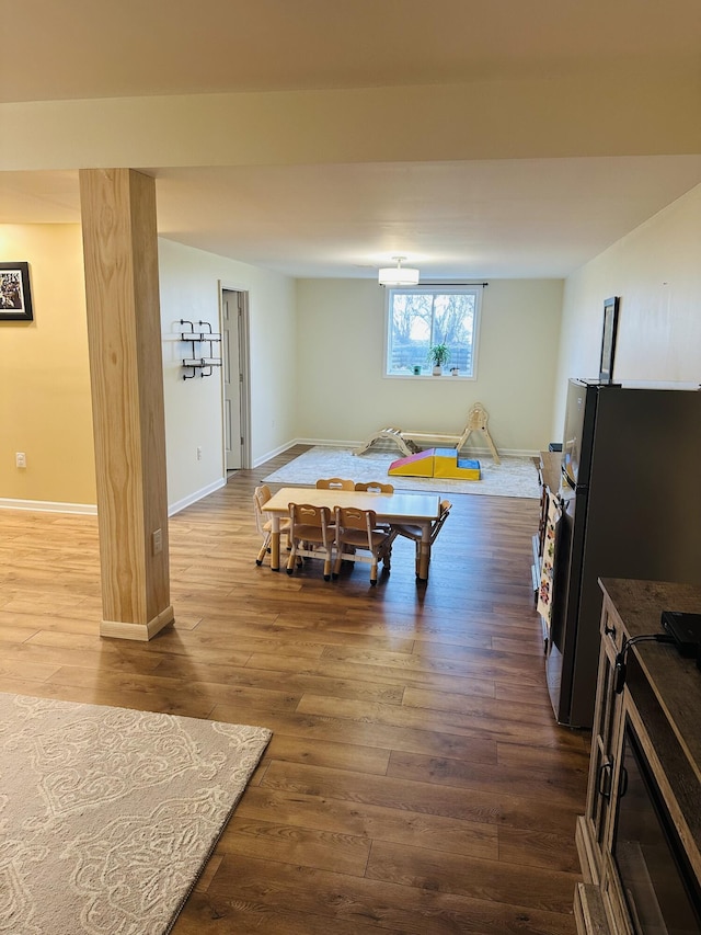 133 Bingham Dr, Brooklyn, MI 49230 - game room featuring dark wood-style flooring and baseboards