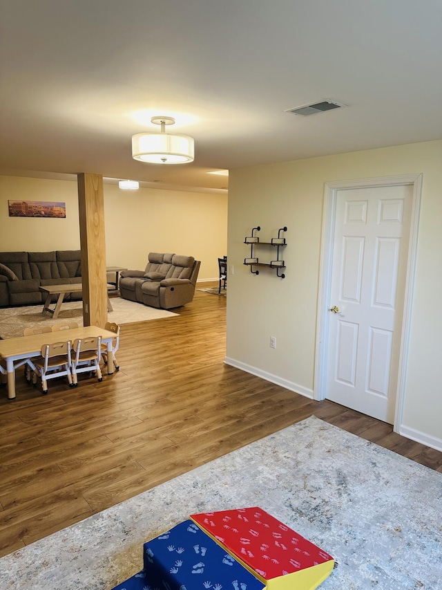 133 Bingham Dr, Brooklyn, MI 49230 - living room featuring wood finished floors and baseboards