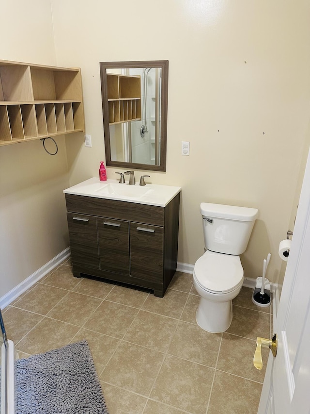 133 Bingham Dr, Brooklyn, MI 49230 - bathroom with baseboards, tile patterned floors, vanity, and toilet