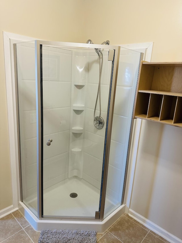 133 Bingham Dr, Brooklyn, MI 49230 - full bathroom with tile patterned flooring and a shower stall