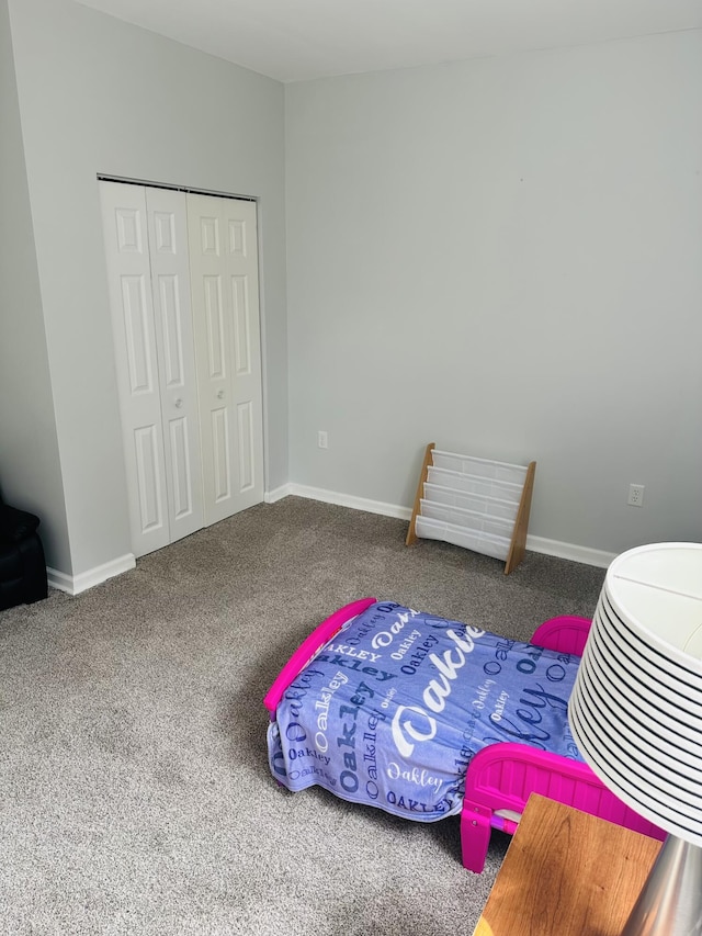 133 Bingham Dr, Brooklyn, MI 49230 - carpeted bedroom featuring a closet and baseboards