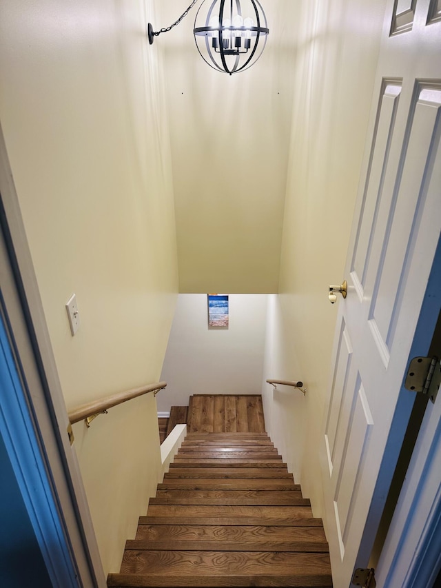 133 Bingham Dr, Brooklyn, MI 49230 - stairs with a chandelier