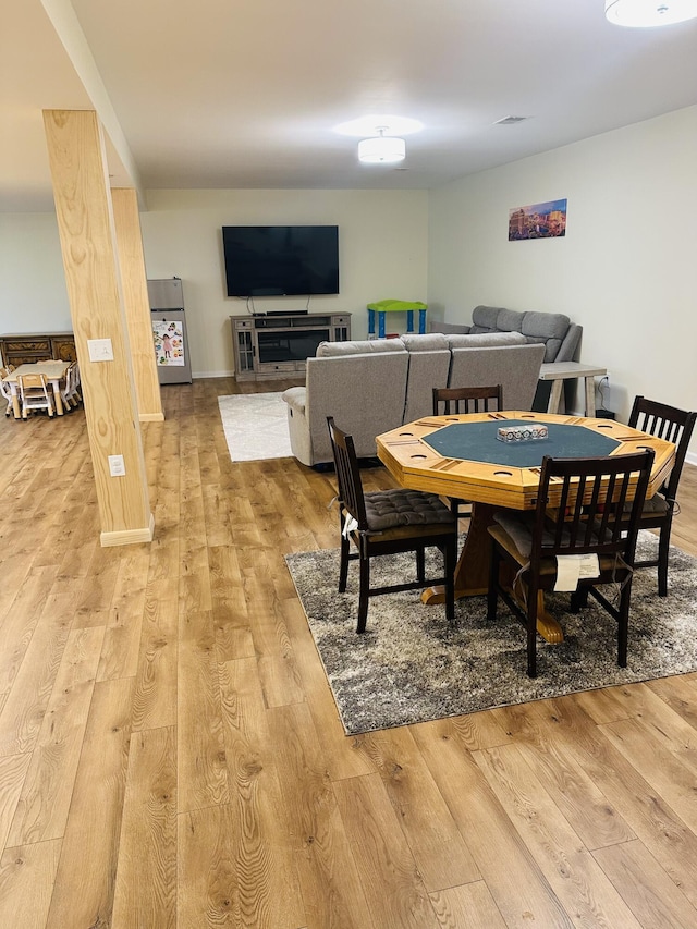 133 Bingham Dr, Brooklyn, MI 49230 - dining space featuring light wood-style floors
