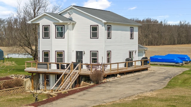 14204 Northmoor Dr, Cement City, MI 49233 - rear view of house featuring a deck