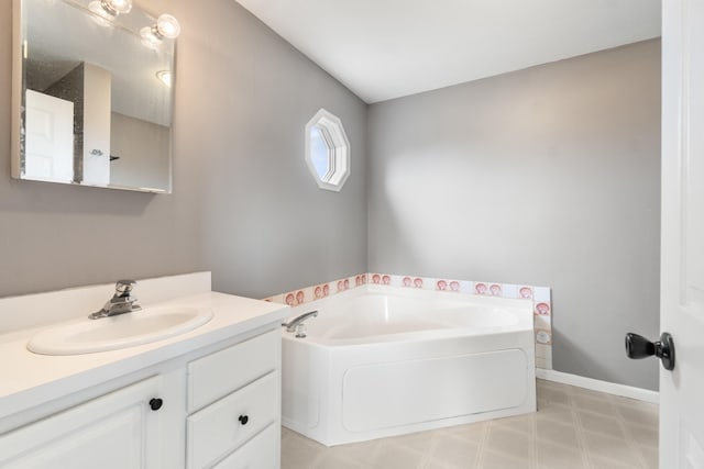 14204 Northmoor Dr, Cement City, MI 49233 - full bath with tile patterned floors, vanity, and a bath