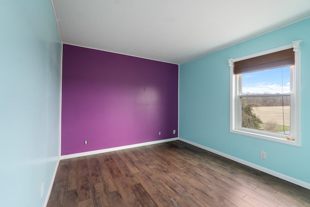 14204 Northmoor Dr, Cement City, MI 49233 - spare room featuring hardwood / wood-style floors and baseboards
