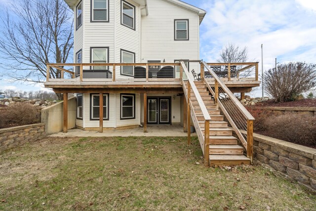 14204 Northmoor Dr, Cement City, MI 49233 - rear view of house featuring a patio, a yard, a wooden deck, and stairs