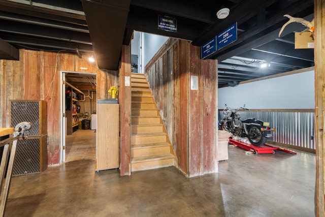 14204 Northmoor Dr, Cement City, MI 49233 - below grade area with stairs and wooden walls