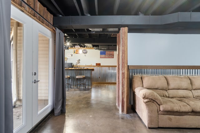 14204 Northmoor Dr, Cement City, MI 49233 - interior space with a bar and concrete floors