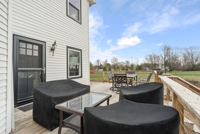 14204 Northmoor Dr, Cement City, MI 49233 - deck with outdoor dining area