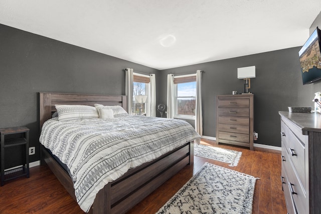 14204 Northmoor Dr, Cement City, MI 49233 - bedroom with dark wood-style flooring and baseboards