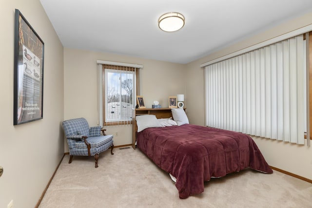 3755 Oak Dr, Ypsilanti, MI 48197 - bedroom featuring light carpet and baseboards