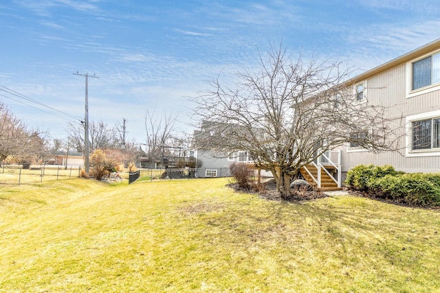 3755 Oak Dr, Ypsilanti, MI 48197 - view of yard featuring fence, a wooden deck, and stairs