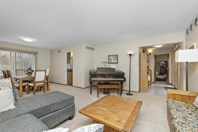 3755 Oak Dr, Ypsilanti, MI 48197 - living area with light colored carpet, baseboards, and visible vents
