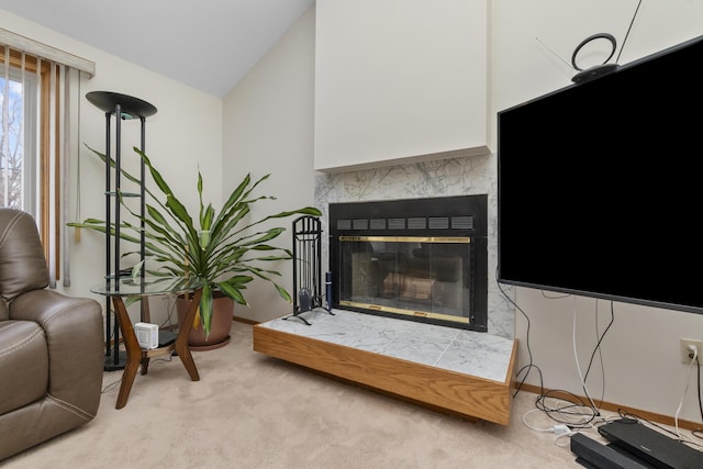 3755 Oak Dr, Ypsilanti, MI 48197 - carpeted living area featuring vaulted ceiling and a premium fireplace