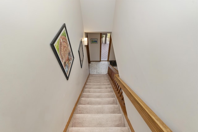 3755 Oak Dr, Ypsilanti, MI 48197 - staircase featuring baseboards and a high ceiling