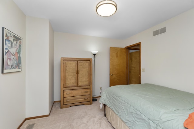 3755 Oak Dr, Ypsilanti, MI 48197 - bedroom featuring light carpet, visible vents, and baseboards