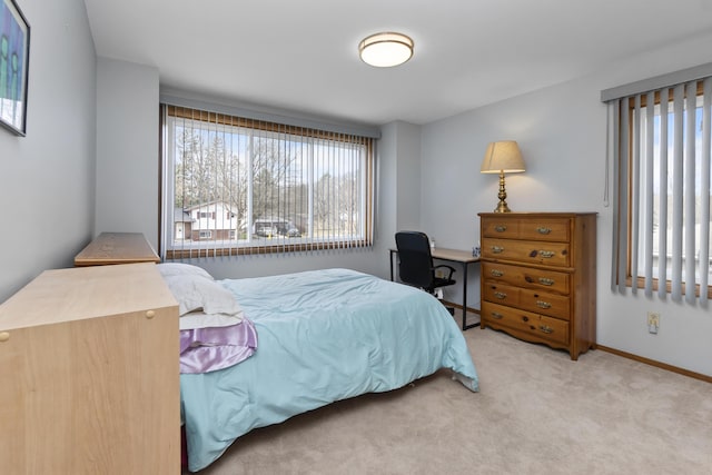 3755 Oak Dr, Ypsilanti, MI 48197 - bedroom featuring baseboards and carpet