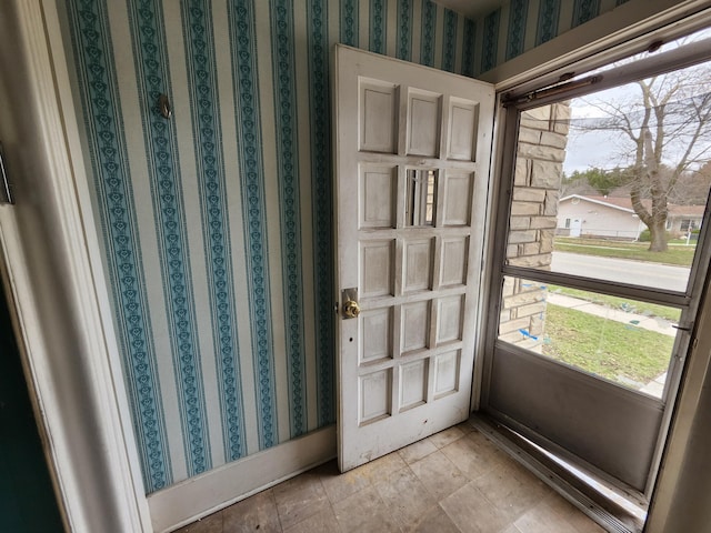 309 N Main St, Scottville, MI 49454 - entrance foyer with wallpapered walls