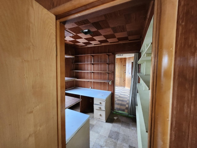 309 N Main St, Scottville, MI 49454 - interior space with wooden walls and tile patterned floors