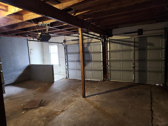 309 N Main St, Scottville, MI 49454 - garage featuring a garage door opener