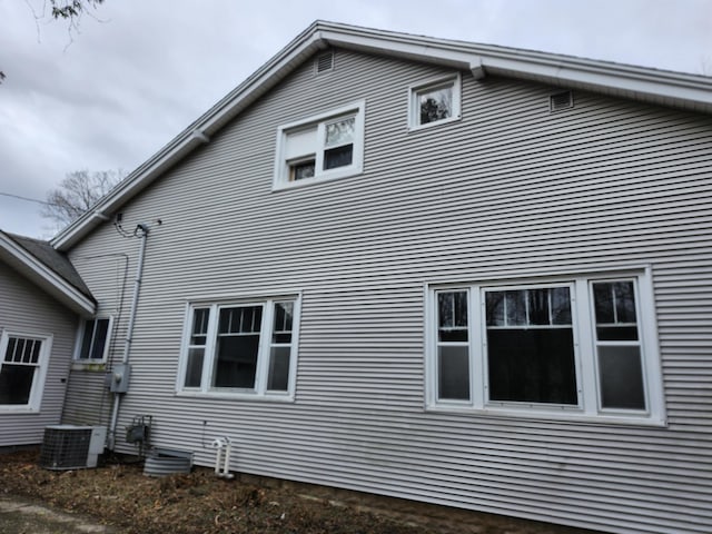 309 N Main St, Scottville, MI 49454 - view of side of property featuring central AC unit
