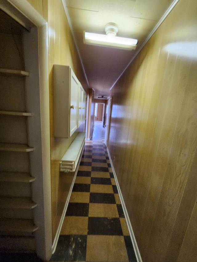 309 N Main St, Scottville, MI 49454 - corridor featuring wood walls and dark floors