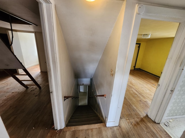 309 N Main St, Scottville, MI 49454 - staircase featuring hardwood / wood-style flooring