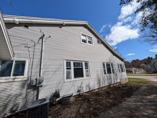 309 N Main St, Scottville, MI 49454 - view of side of property with central air condition unit