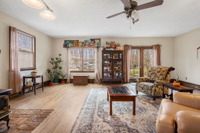 7630 Dilley Rd, Davisburg, MI 48350 - living room featuring healthy amount of natural light, wood finished floors, and ceiling fan