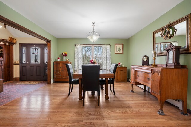 7630 Dilley Rd, Davisburg, MI 48350 - dining room with light wood-style flooring and baseboard heating