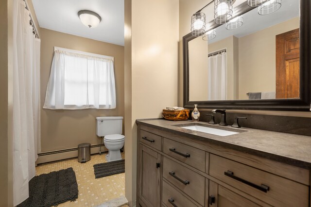 7630 Dilley Rd, Davisburg, MI 48350 - bathroom featuring toilet, a baseboard radiator, and vanity