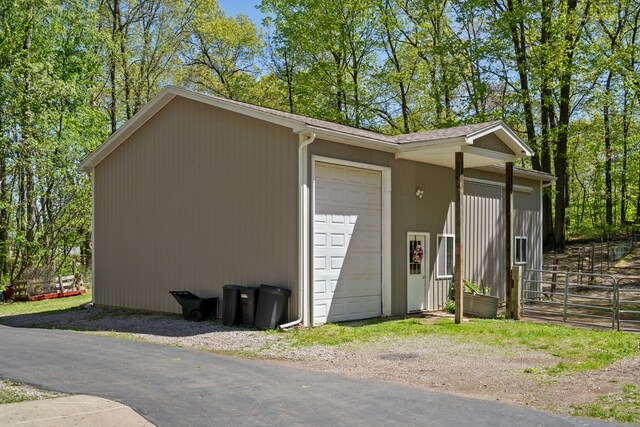 7630 Dilley Rd, Davisburg, MI 48350 - view of outbuilding with fence and an outdoor structure