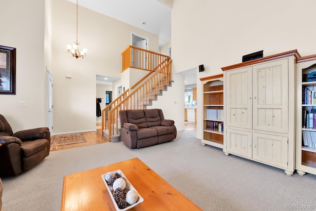 5280 Brantford, Grand Blanc, MI 48439 - living area featuring carpet, a high ceiling, stairway, and a chandelier
