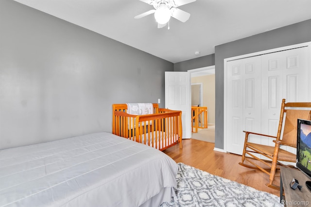 5280 Brantford, Grand Blanc, MI 48439 - bedroom with wood finished floors, a closet, and a ceiling fan