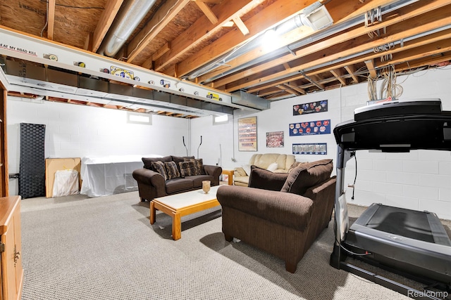 5280 Brantford, Grand Blanc, MI 48439 - living room featuring carpet floors and concrete block wall