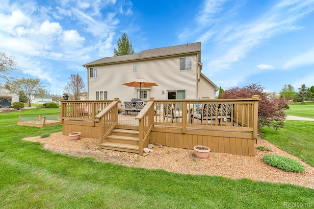 5280 Brantford, Grand Blanc, MI 48439 - rear view of house with a lawn and a wooden deck