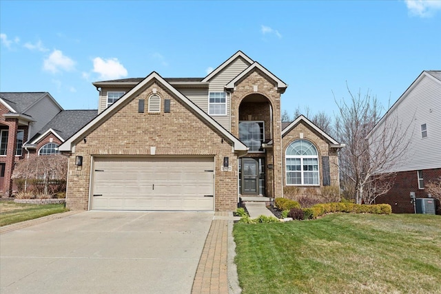 traditional-style home with central AC, brick siding, concrete driveway, and an attached garage