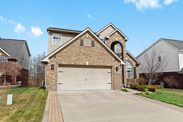 traditional-style house with brick siding, driveway, and a front yard