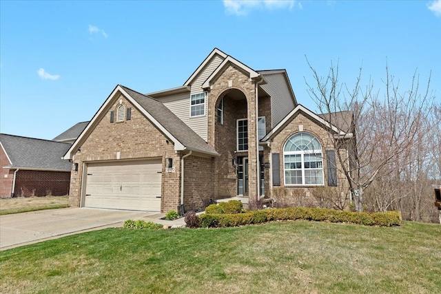 traditional home with a garage, brick siding, a front yard, and concrete driveway