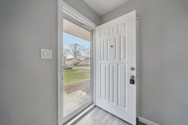 entryway with light wood-type flooring