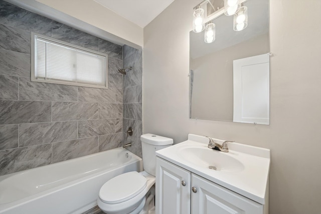 full bathroom featuring toilet, vanity, and bathing tub / shower combination