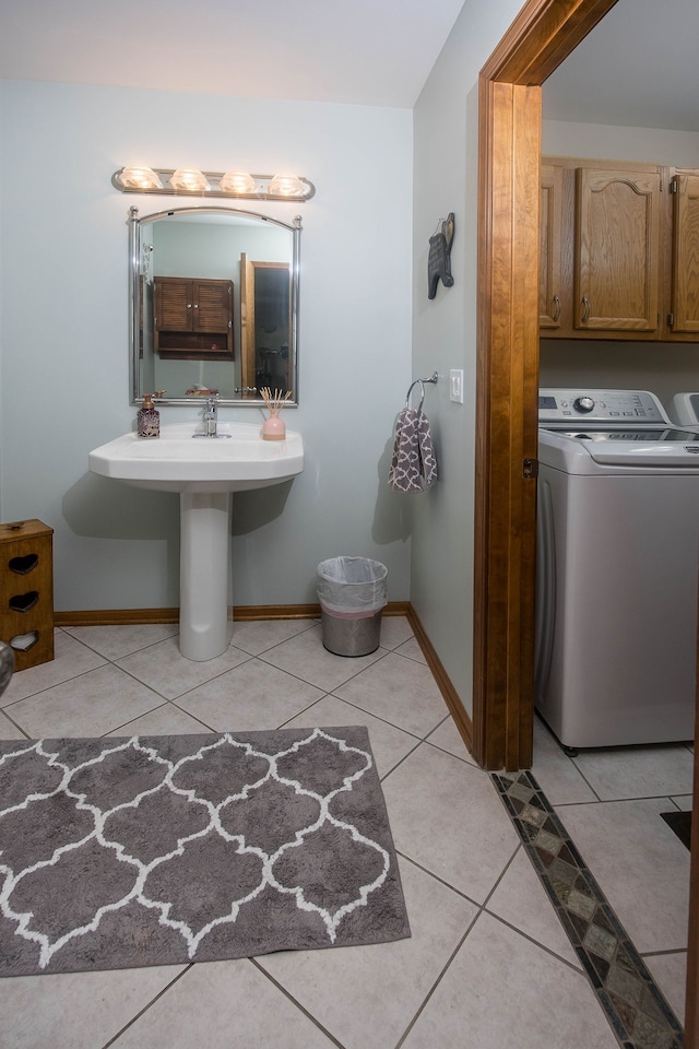 bathroom featuring baseboards and tile patterned flooring