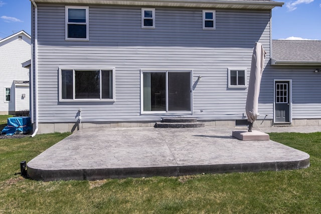 back of property featuring a patio area and entry steps